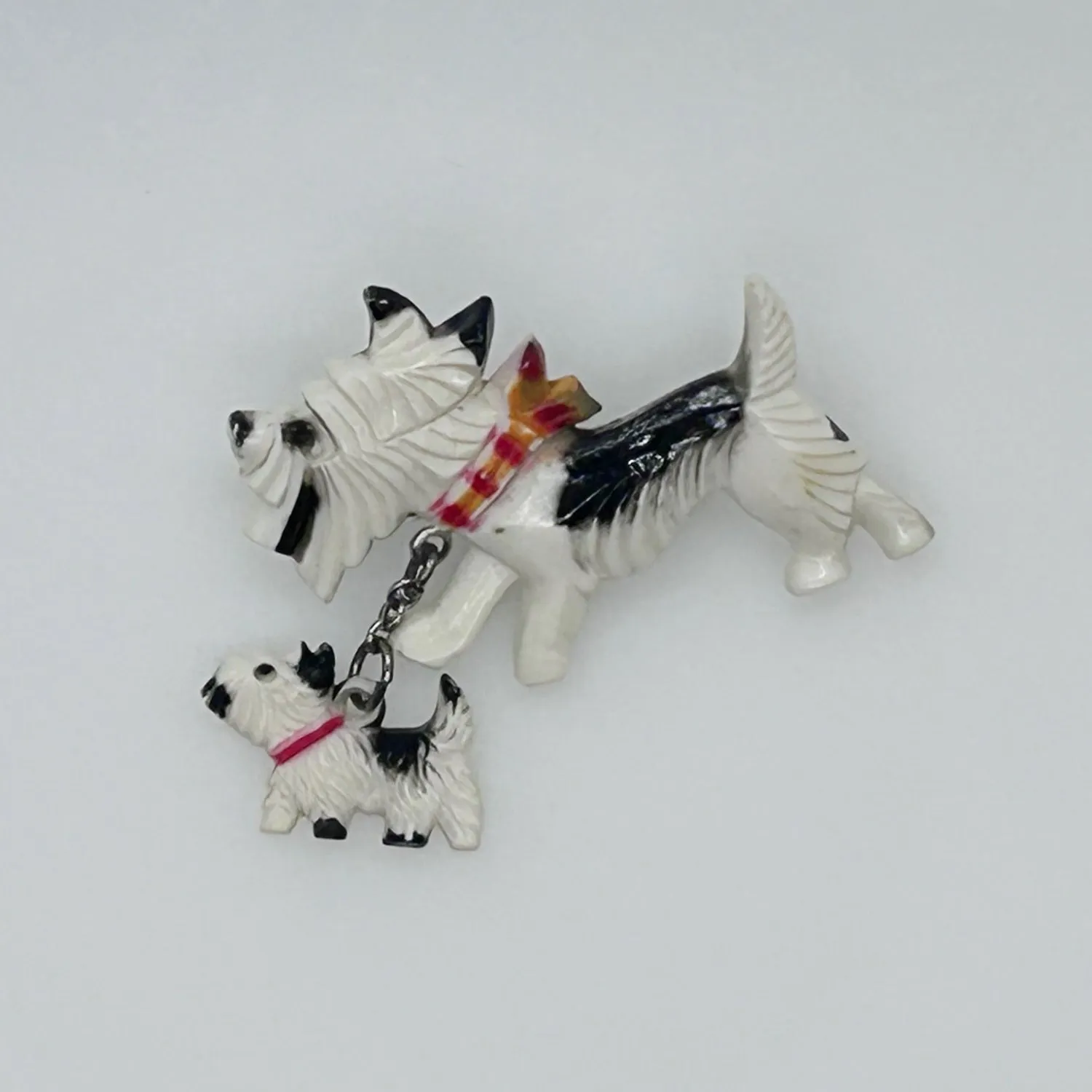 Vintage Celluloid White and Black Terrier and Puppy Pin